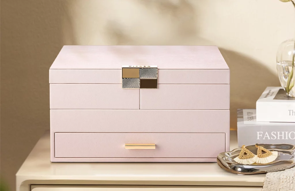 Elegant large jewelry box organizer in ivory on a vanity table with gold accents, perfect for organized jewelry storage Oh Precious