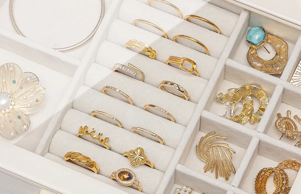 Close up of velvet lining protecting rings in a luxury 5 drawer jewelry box