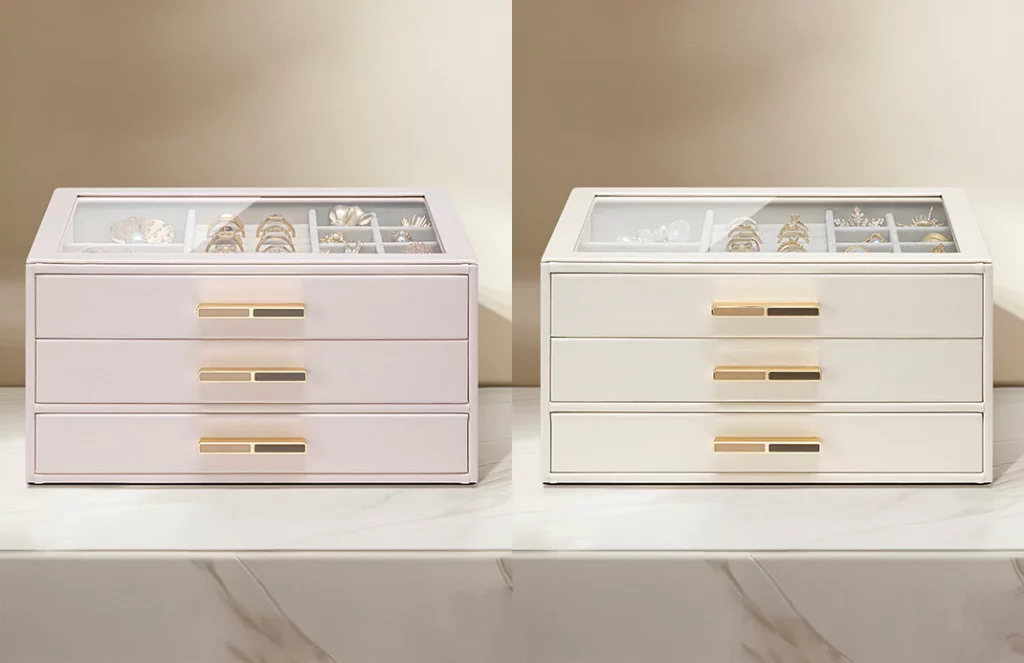 Ivory and blush 3-drawer jewelry boxes with gold handles, display-worthy design