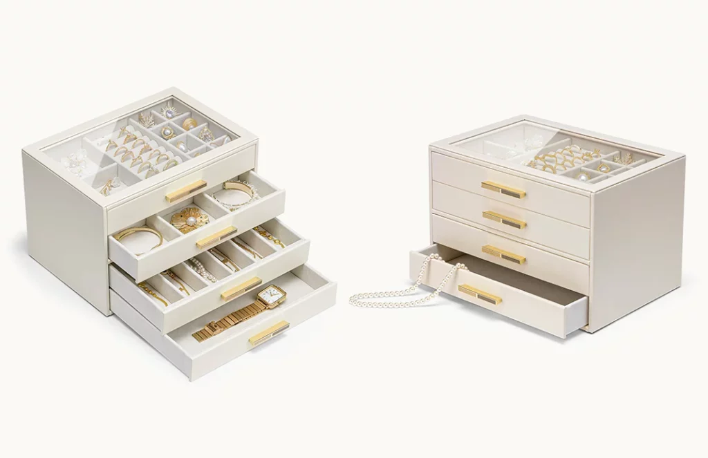 Ivory and blush 4-drawer jewelry boxes with gold handles, display-worthy design
