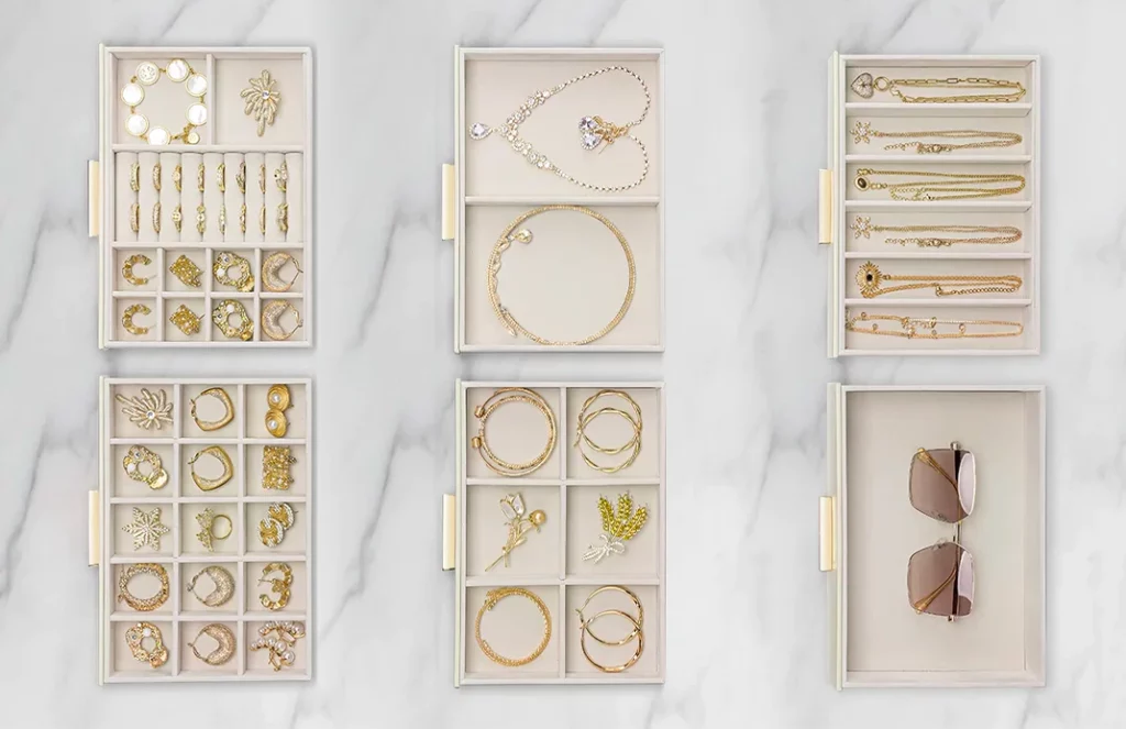 Open 6-drawer jewelry box with ring rolls, earring grid, and adjustable compartments