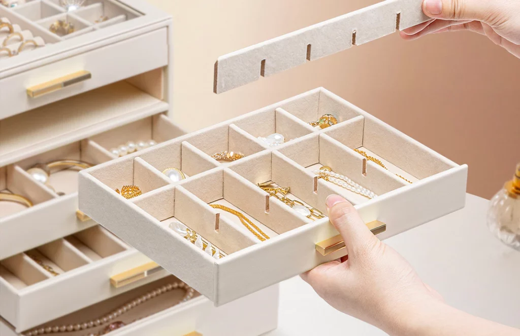 Close-up of velvet lining protecting rings in a 4-drawer organizer