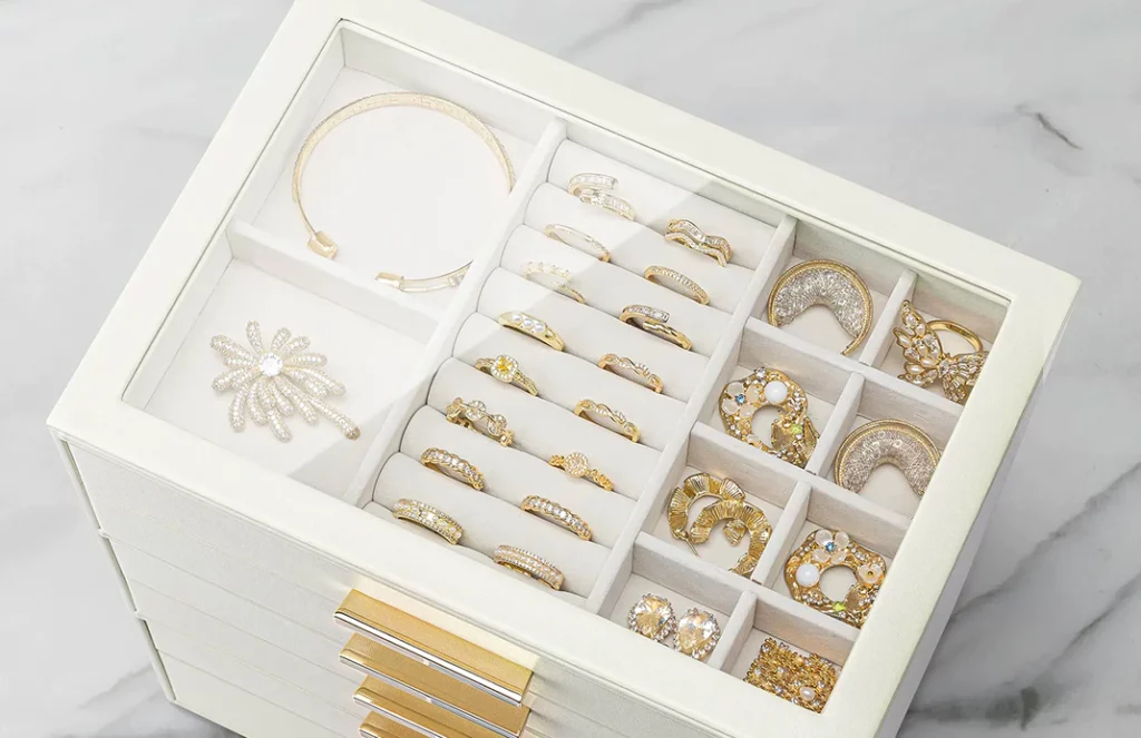 Close-up of velvet lining protecting rings in a 6-drawer organizer